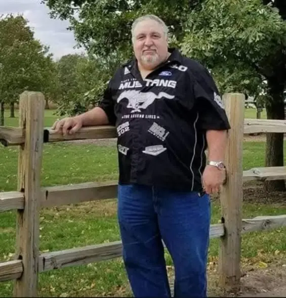 Scott G. Clayton wearing a Mustang button-down shirt